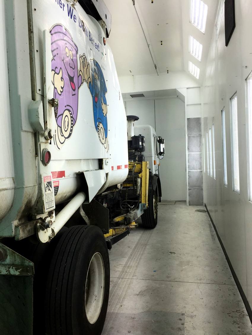 Large commercial vehicle inside the oversized paint booth