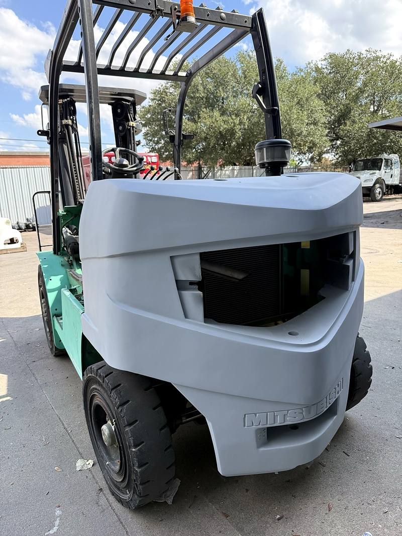 Forklift stripped back and coated in grey primer